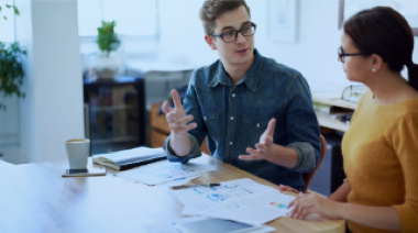 Two people talking Image